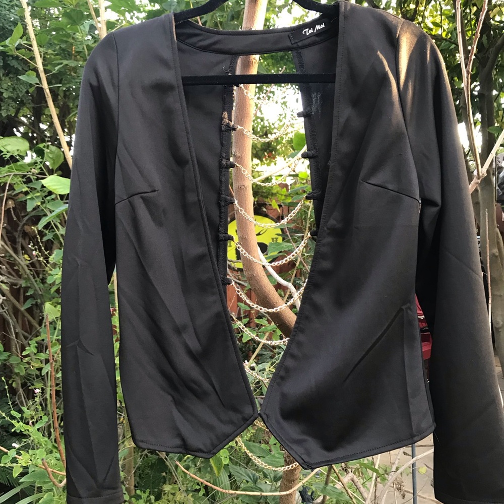 Black Jacket with open back chain.